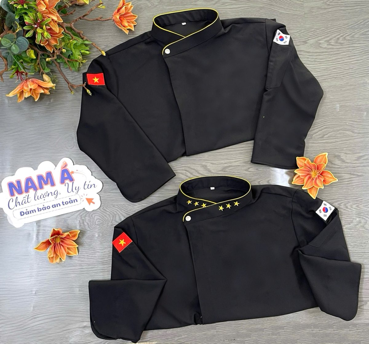 Áo bếp đen viền vàng thêu cờ Việt Nam – Hàn Quốc của Đồng phục Nam Á, giao tận nơi tại Hải Châu